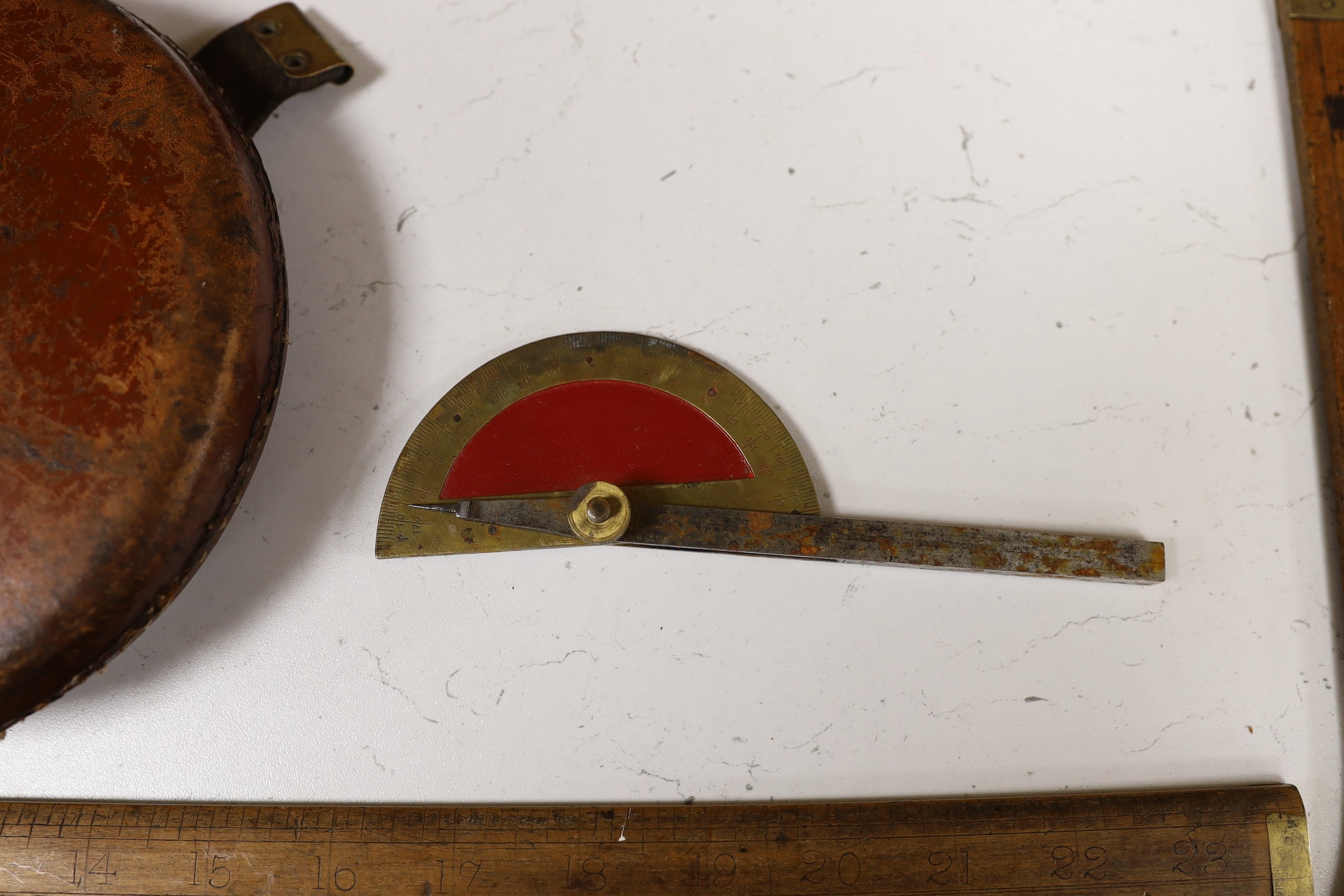 Two Aston & Mander rulers, a Chesterman tape measure and a protractor